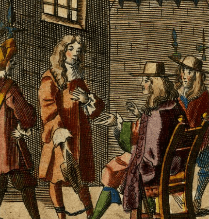 a man being interrogated in prison